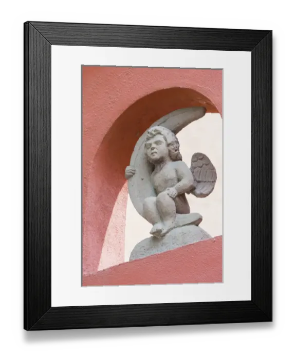 Framed Print : Mexico, San Miguel de Allende. Cherub holding quarter moon Framed Print : Mexico, San Miguel de Allende. Cherub holding quarter moon