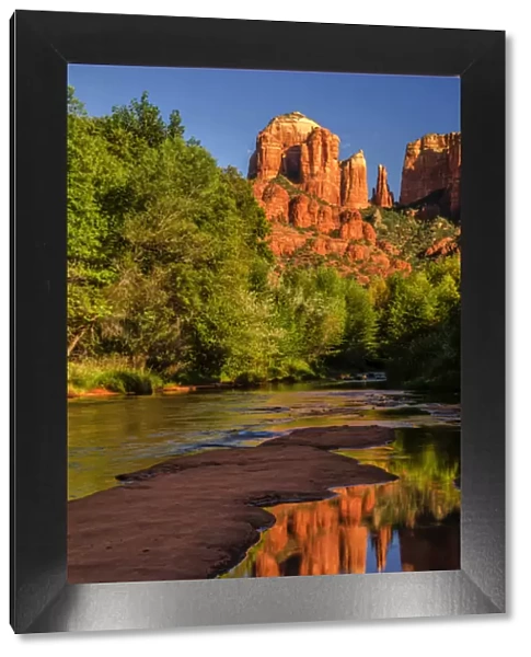USA, Arizona. Cathedral Rock reflects in creek