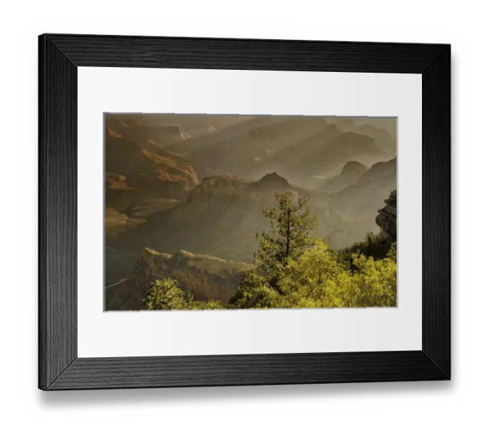 Framed Print : USA, Arizona, Grand Canyon National Park. Sunrise God rays shine on park formations