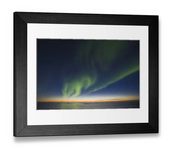 Framed Print : The Big Dipper hangs over curtains of green Aurora Borealis dancing over the iceberg Framed Print : The Big Dipper hangs over curtains of green Aurora Borealis dancing over the iceberg