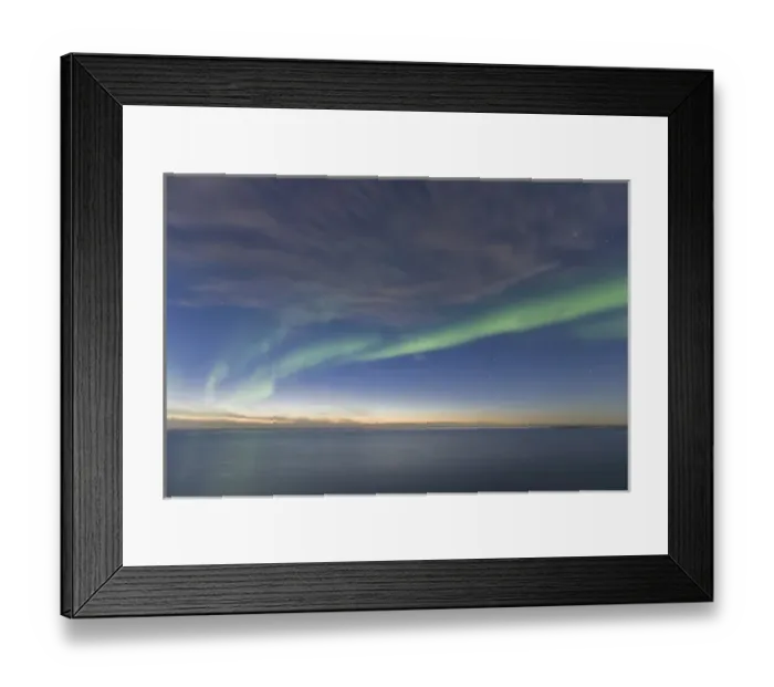 Framed Print : Curtains of green Aurora Borealis dance over the iceberg dotted surface of the Beaufort Framed Print : Curtains of green Aurora Borealis dance over the iceberg dotted surface of the Beaufort