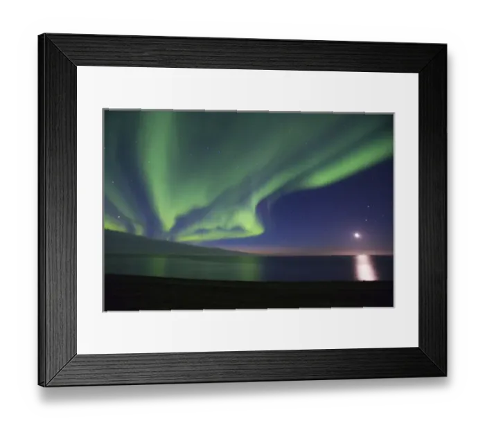 Framed Print : The moon shines down on the Arctic Ocean as curtains of green Aurora Borealis dance overhead Framed Print : The moon shines down on the Arctic Ocean as curtains of green Aurora Borealis dance overhead