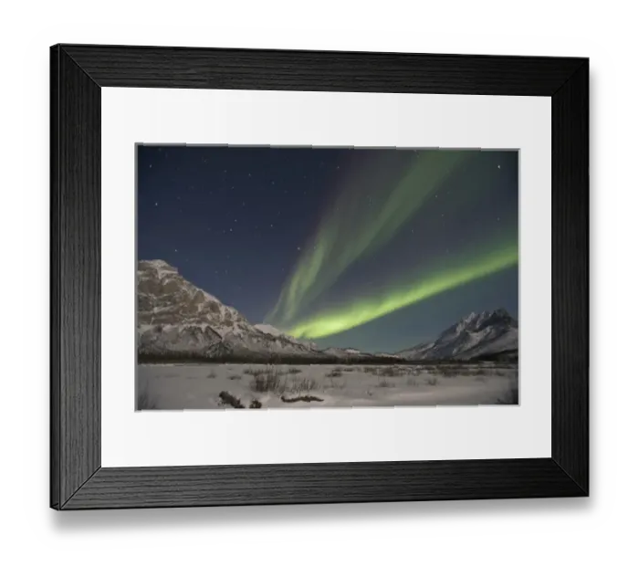 Framed Print : Curtains of green aurora borealis fill the sky over high peaks of the Central Brooks