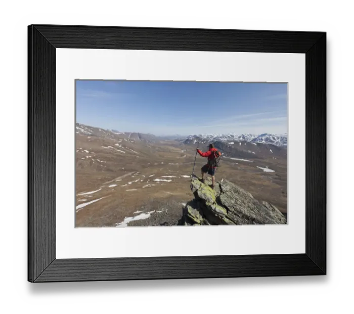 Framed Print : A hiker looks across the upper Nigu River Valley in Gates of the Arctic National Park and Preserve