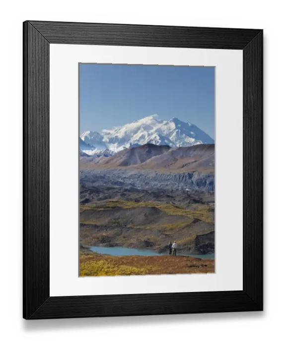 Framed Print : A couple of hikers enjoy spectacular views on a sunny fall day of Mt Framed Print : A couple of hikers enjoy spectacular views on a sunny fall day of Mt