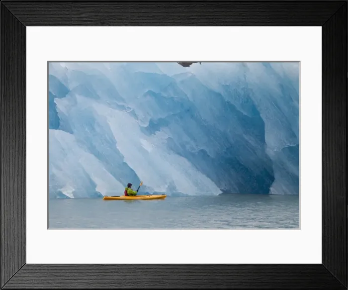 Framed Print : Port Nellie Juan, Prince William Sound, Alaska, a kayaker pauses to look at a magnificent