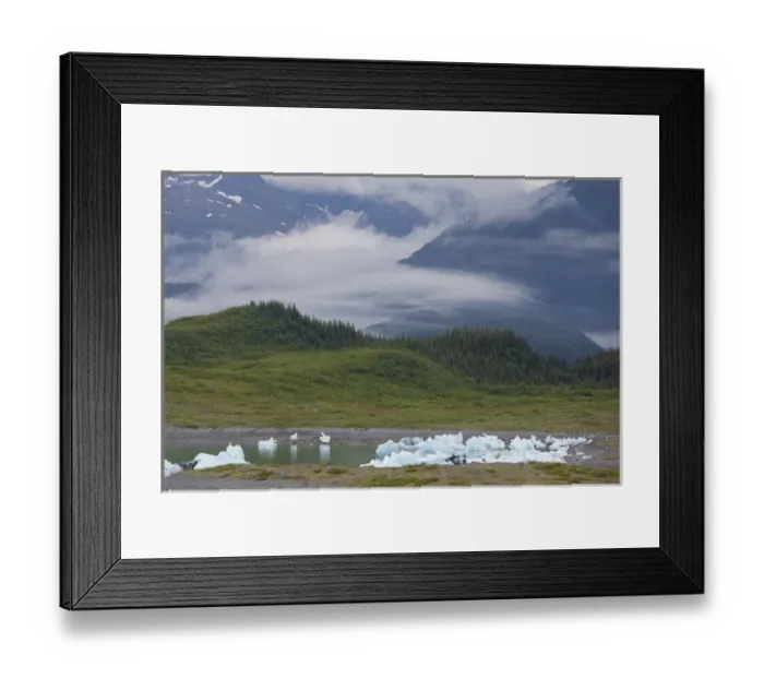 Framed Print : Beached icebergs sit in Columbia Bay at the foot of the Chugach Mountains, on a misty