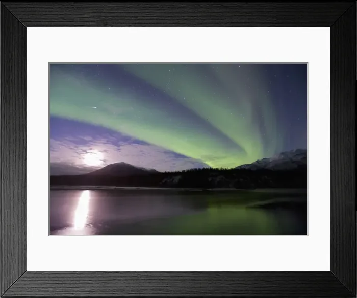 Framed Print : A shooting star cuts through curtains of green aurora borealis dancing over Framed Print : A shooting star cuts through curtains of green aurora borealis dancing over