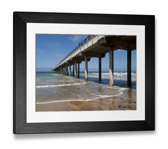 Framed Print : USA, California, La Jolla, Surfer goes out next to Scripps Pier