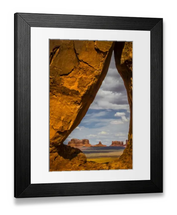 Framed Print : View through the Teardrop Arch into Monument Valley Tribal Park of the Navajo Nation Framed Print : View through the Teardrop Arch into Monument Valley Tribal Park of the Navajo Nation