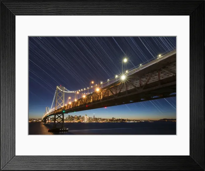 Framed Print : USA, California, San Francisco. Composite of star trails above Bay Bridge. Credit as Framed Print : USA, California, San Francisco. Composite of star trails above Bay Bridge. Credit as