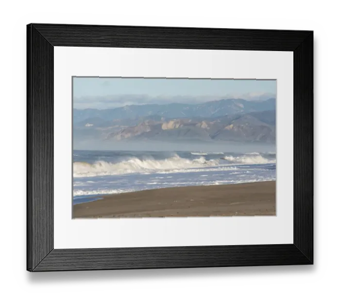 Framed Print : US, CA, Oxnard. Offshore wind blows spray back from waves. Ventura and foothills