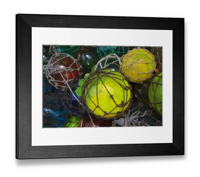 Framed Print : USA; North America; Florida; Apalachicola; Colorful bouys draped in netting Framed Print : USA; North America; Florida; Apalachicola; Colorful bouys draped in netting