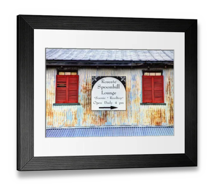 Framed Print : USA; North America; Florida; Apalachicola; Old tin building with red shutters Framed Print : USA; North America; Florida; Apalachicola; Old tin building with red shutters