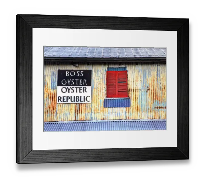 Framed Print : USA; North America; Florida; Apalachicola; Old tin building with red shutters Framed Print : USA; North America; Florida; Apalachicola; Old tin building with red shutters