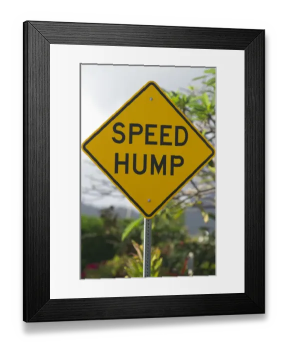 Framed Print : Road sign warnig of speed hump on the island of Kauai, Hawaii, USA