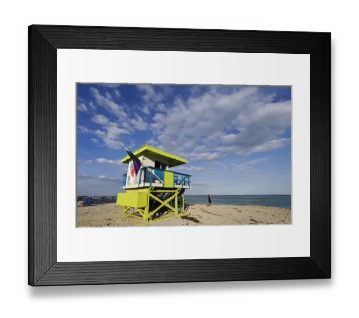 Framed Print : USA, Florida, Miami, South Beach. Man walks by lifeguard station on South Beach Framed Print : USA, Florida, Miami, South Beach. Man walks by lifeguard station on South Beach