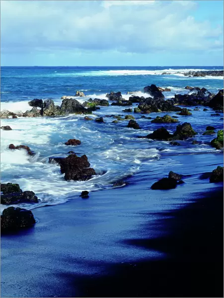 USA; Hawaii, Hawaii; Waves breaking on a black sand beach
