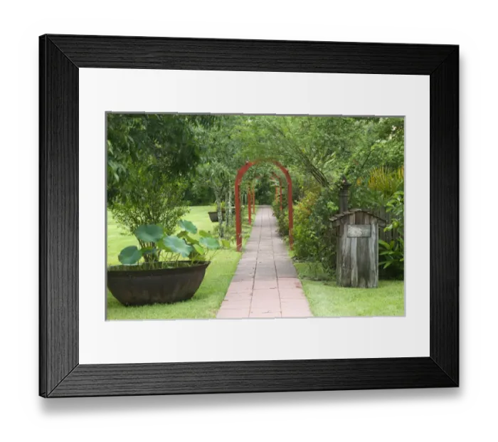 Framed Print : LA, Vacherie, Laura Plantation, Walkway with sugar kettle on the sugarcane plantation Framed Print : LA, Vacherie, Laura Plantation, Walkway with sugar kettle on the sugarcane plantation