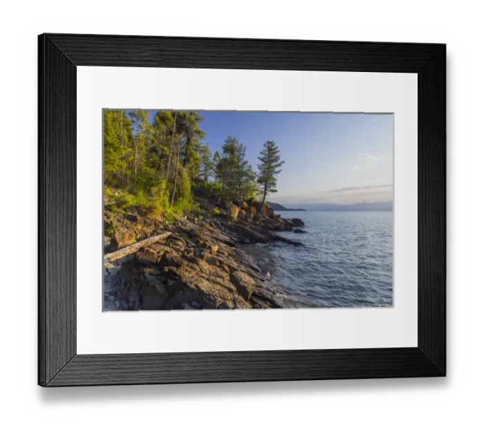 Framed Print : Shoreline of Flathead Lake receives sunrise light at West Shore State Park near Lakeside