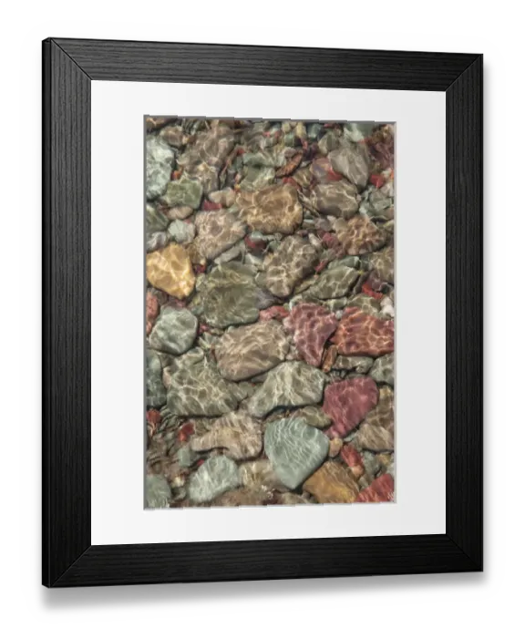 Framed Print : USA, Montana, Glacier National Park. Multi-colored stones line shore on St Mary Lake