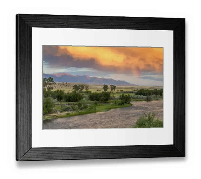 Framed Print : Incredible stormy light on the Madison River at sunset near Ennis, Montana, USA