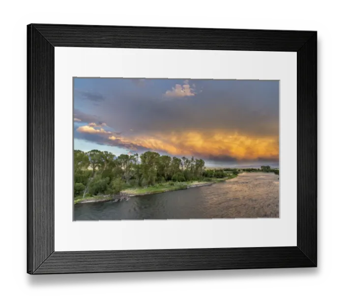 Framed Print : Incredible stormy light on the Madison River at sunset near Ennis, Montana, USA