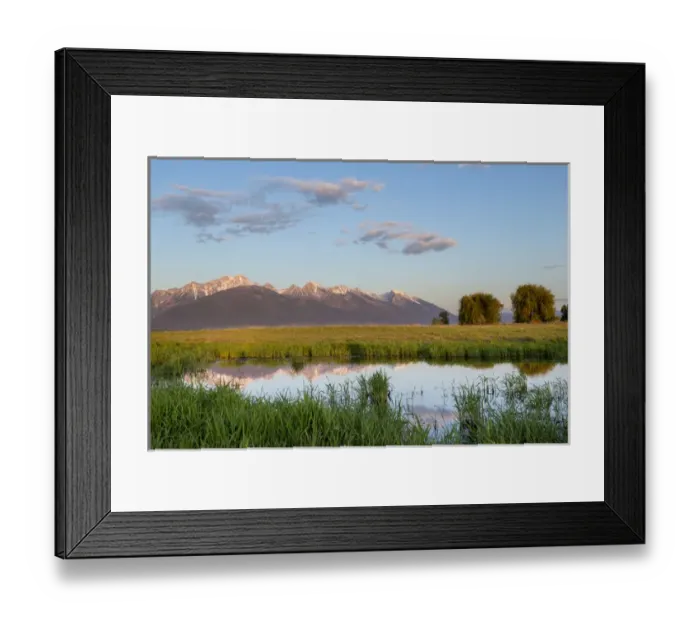 Framed Print : Small pond reflects the Mission Mountains at the Ninepipe WMA in the Mission Valley Framed Print : Small pond reflects the Mission Mountains at the Ninepipe WMA in the Mission Valley