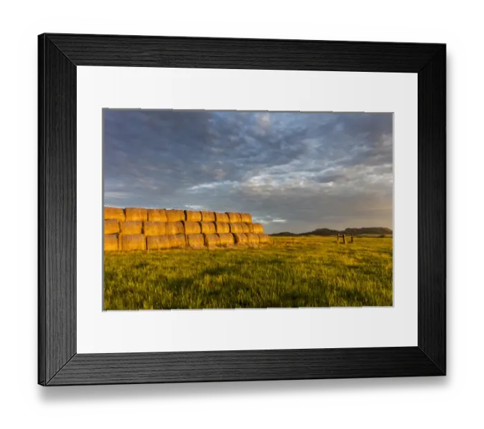 Framed Print : Hay bales and Chalk Buttes receive beautiful morning light near Ekalaka, Montana, USA Framed Print : Hay bales and Chalk Buttes receive beautiful morning light near Ekalaka, Montana, USA