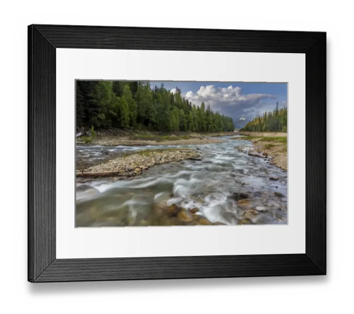 Framed Print : Doris Creek runs into Hungry Horse Reservoir with Flathead Range in background in