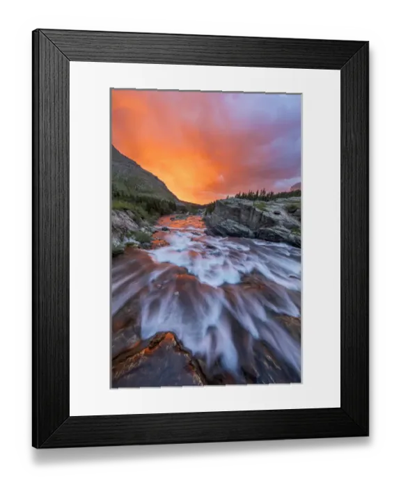 Framed Print : Brlliant sunrise sky over Swiftcurrent Falls in Glacier National Park, Montana, USA