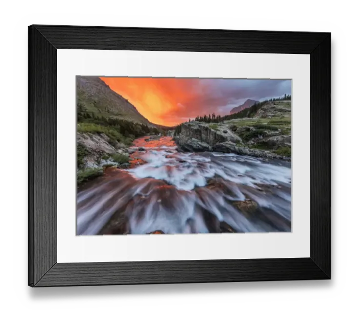 Framed Print : Brlliant sunrise sky over Swiftcurrent Falls in Glacier National Park, Montana, USA