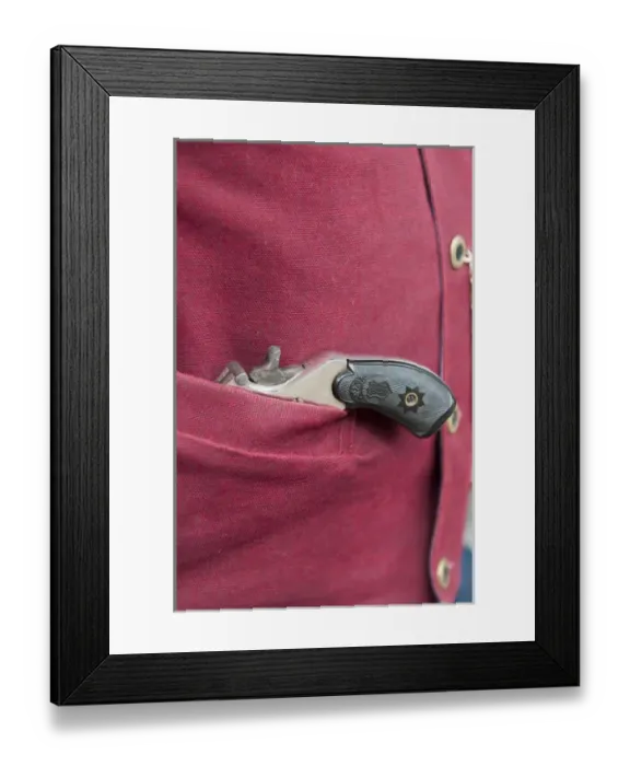 Framed Print : USA, Nevada. People in period dress with derringer pistol in Virginia CIty, Nevada Framed Print : USA, Nevada. People in period dress with derringer pistol in Virginia CIty, Nevada