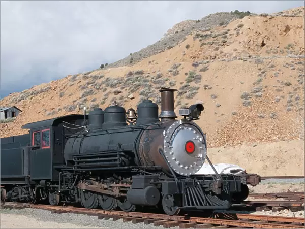 USA, Nevada. Old steam train engine in historic Gold Hill train station, our side Virginia CIty