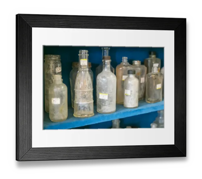 Framed Print : Dirty antique glass bottles on display, Albuquerque, New Mexico, USA. Central Ave Framed Print : Dirty antique glass bottles on display, Albuquerque, New Mexico, USA. Central Ave