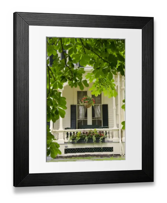 Framed Print : New York, Cooperstown. Typical historic Cooperstown home with flowers on veranda