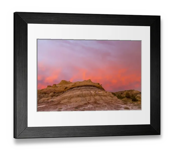 Framed Print : Fiery sunrise clouds over badlands at dawn in Theodore Roosevelt National Park, North Dakota Framed Print : Fiery sunrise clouds over badlands at dawn in Theodore Roosevelt National Park, North Dakota