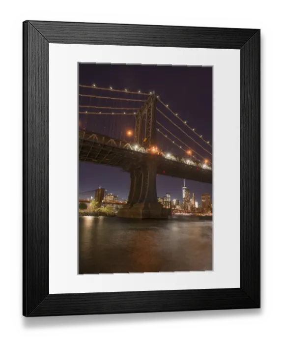 Framed Print : The Manhattan Bridge and Manhattan skyline in the evening light from Brooklyn Bridge Park