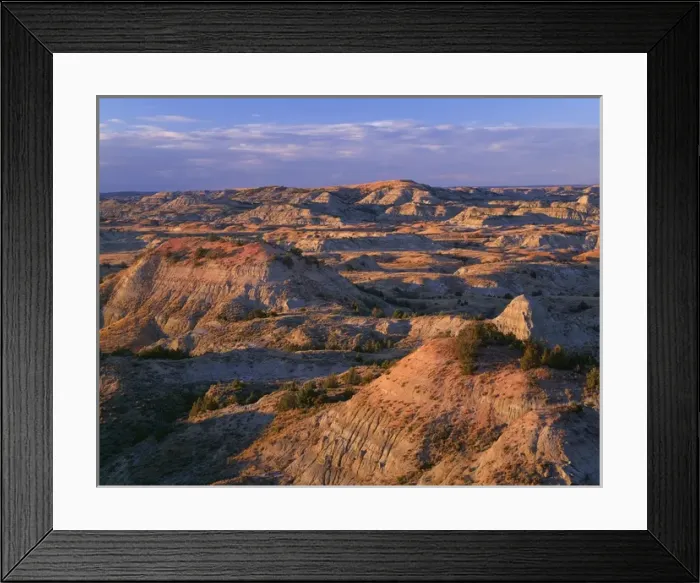 Framed Print : USA, North Dakota, Theodore Roosevelt National Park, Evening light defines eroded