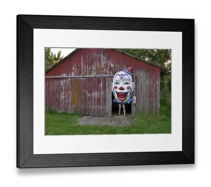 Framed Print : USA, Oregon, Oregon City. Person holding clown face in door of barn Framed Print : USA, Oregon, Oregon City. Person holding clown face in door of barn