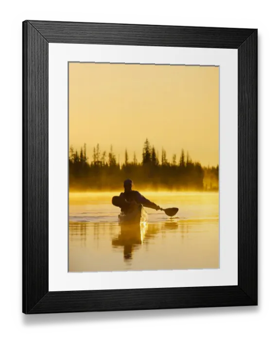 Framed Print : USA, Oregon. A woman in a sea kayak paddles at dawn on Big Lake, Oregon, in the Oregon Cascades Framed Print : USA, Oregon. A woman in a sea kayak paddles at dawn on Big Lake, Oregon, in the Oregon Cascades