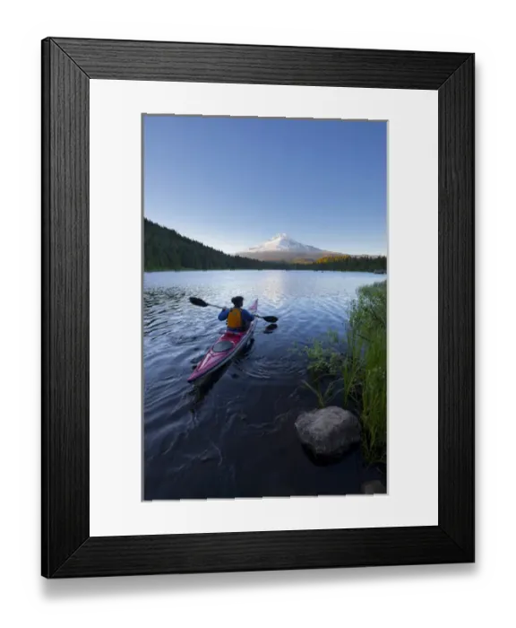 Framed Print : USA, Oregon. A woman in a sea kayak paddles on Trillium Lake, Oregon, in the Oregon Cascades Framed Print : USA, Oregon. A woman in a sea kayak paddles on Trillium Lake, Oregon, in the Oregon Cascades