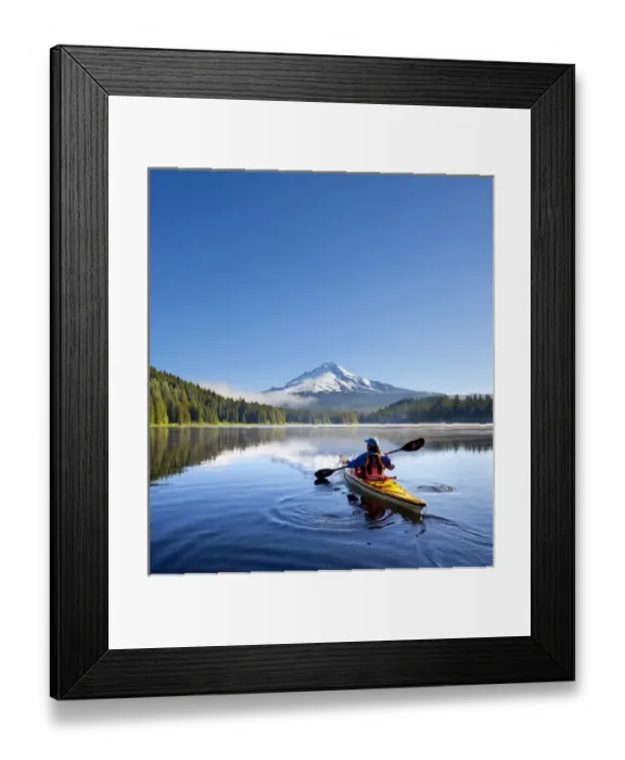 Framed Print : USA, Oregon. A woman in a sea kayak paddles on Trillium Lake, Oregon, in the Oregon Cascades Framed Print : USA, Oregon. A woman in a sea kayak paddles on Trillium Lake, Oregon, in the Oregon Cascades