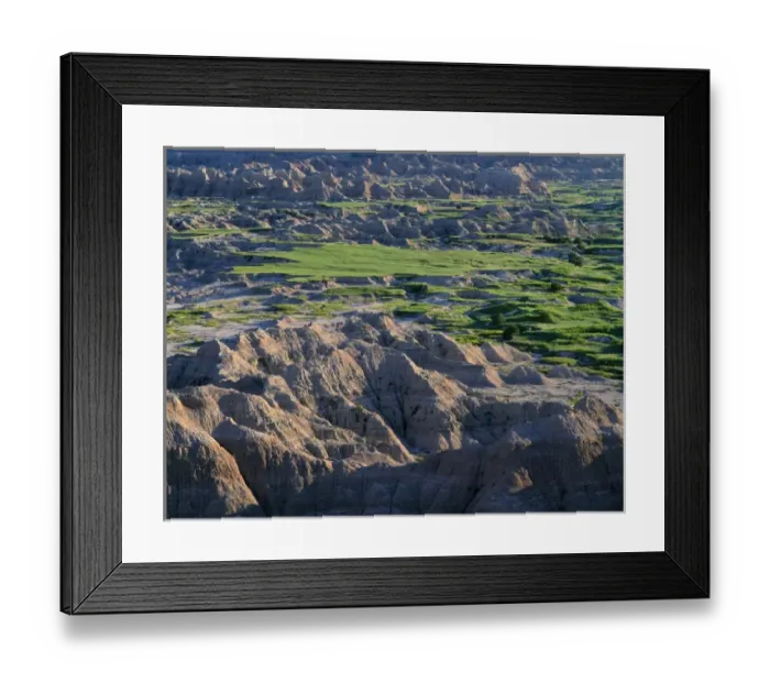 Framed Print : USA, South Dakota, Badlands National Park, North Unit, Grassy tables display spring growth