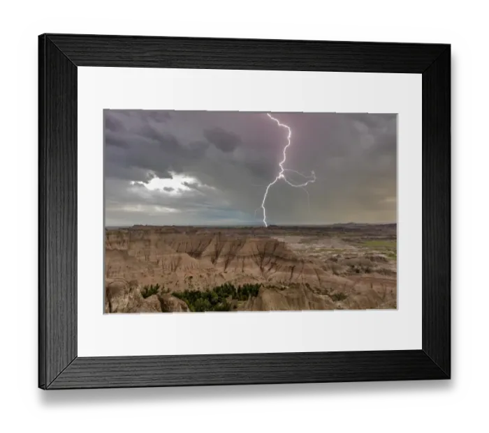 Framed Print : Lightning strike during thunderstorm from the Pinnacles Overlook in Badlands National Park Framed Print : Lightning strike during thunderstorm from the Pinnacles Overlook in Badlands National Park