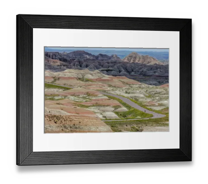 Framed Print : Road cycling in Badlands National Park, South Dakota, USA Framed Print : Road cycling in Badlands National Park, South Dakota, USA