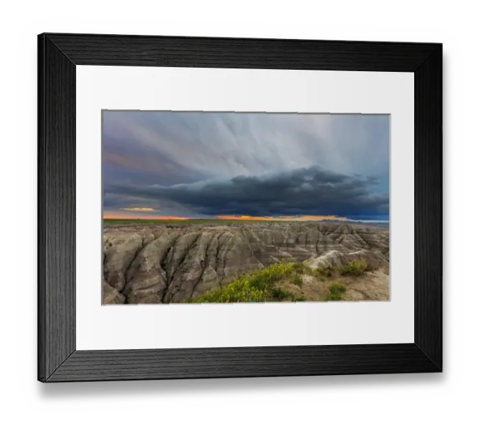 Framed Print : Dramatic storm cloud at sunrise in Badlands National Park, South Dakota, USA Framed Print : Dramatic storm cloud at sunrise in Badlands National Park, South Dakota, USA