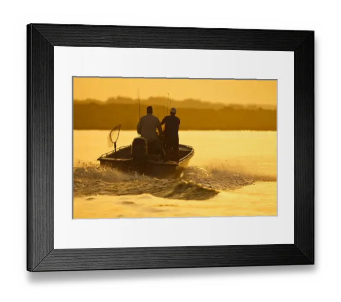 Framed Print : Fishermen boating toward the Laguna Madre, Texas, sunrise Framed Print : Fishermen boating toward the Laguna Madre, Texas, sunrise