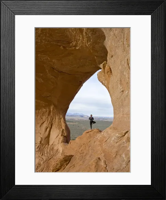Framed Print : Climbing guide with Moab Desert Adventures, does yoga on Looking Glass Rock, near Moab Framed Print : Climbing guide with Moab Desert Adventures, does yoga on Looking Glass Rock, near Moab