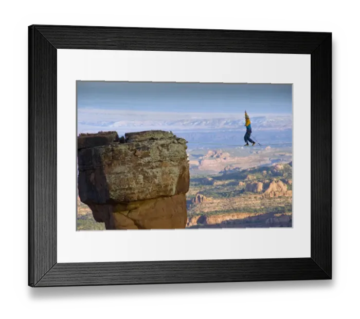Framed Print : Larry Harpe highlining (slacklining) between Navaho Sandstone Towers on BLM land near Moab Framed Print : Larry Harpe highlining (slacklining) between Navaho Sandstone Towers on BLM land near Moab